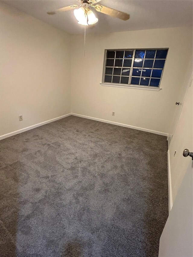 1109 Roman Rd, Grand Prairie, TX 75050 - carpeted spare room featuring ceiling fan and baseboards