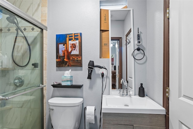 741 N Robinson St, Cleburne, TX 76031 - full bathroom featuring toilet, a textured wall, vanity, and a stall shower