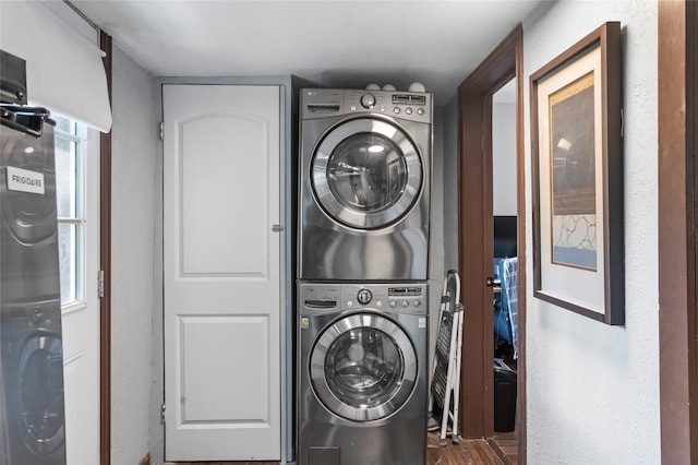 741 N Robinson St, Cleburne, TX 76031 - laundry area featuring stacked washer / drying machine