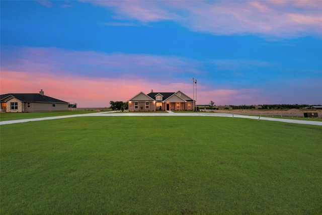126 Range Ln, Decatur, TX 76234 - view of front of property featuring curved driveway and a lawn