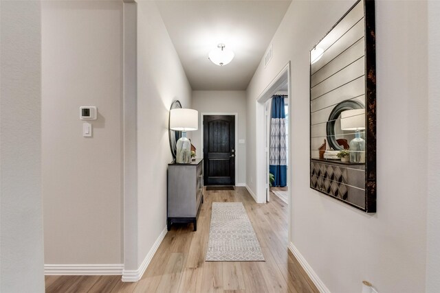 126 Range Ln, Decatur, TX 76234 - doorway to outside with light wood-type flooring and baseboards