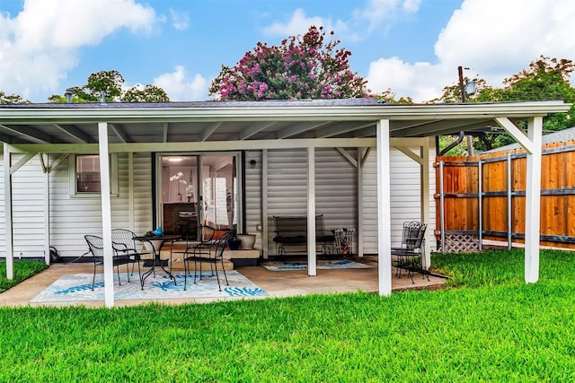rear view of house with a patio