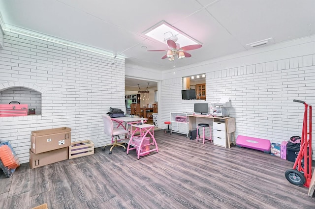 112 S Wood Ave, Denison, TX 75020 - office with brick wall, ceiling fan, and wood finished floors
