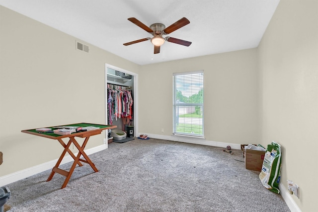 112 S Wood Ave, Denison, TX 75020 - unfurnished bedroom with carpet flooring, baseboards, and a ceiling fan