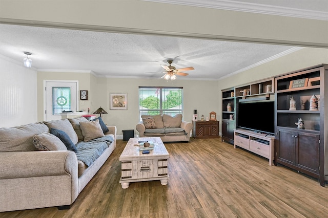 112 S Wood Ave, Denison, TX 75020 - living room featuring wood finished floors, a textured ceiling, crown molding, and ceiling fan