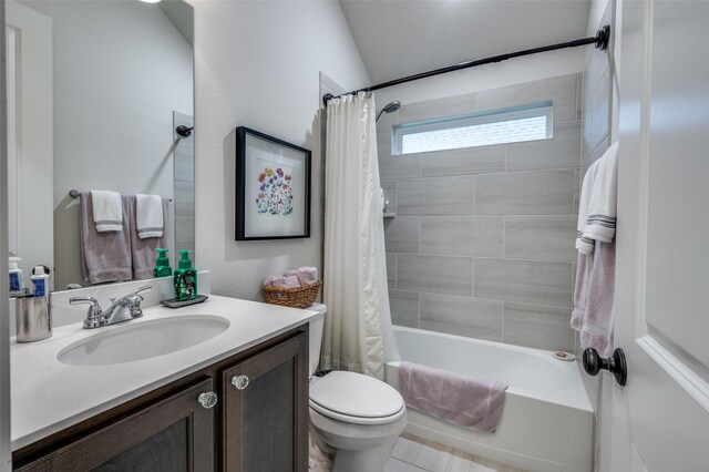 7412 Foxgrass Pl, Fort Worth, TX 76123 - bathroom featuring toilet, shower / bath combo with shower curtain, and vanity