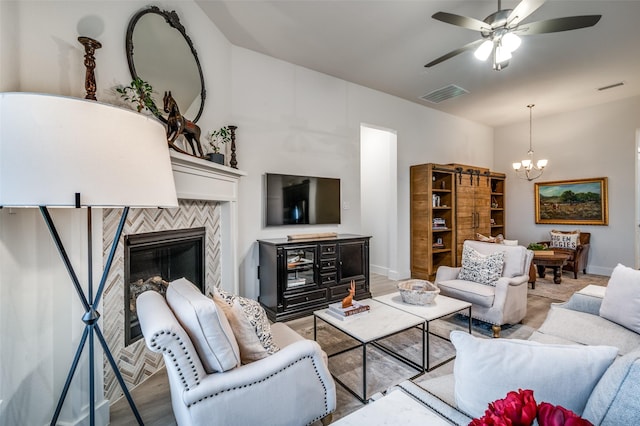 7412 Foxgrass Pl, Fort Worth, TX 76123 - living area with a chandelier, ceiling fan, a tile fireplace, and baseboards