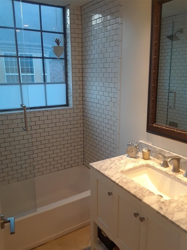 3817 Gilbert Ave Unit 108, Dallas, TX 75219 - bathroom with vanity and enclosed tub / shower combo