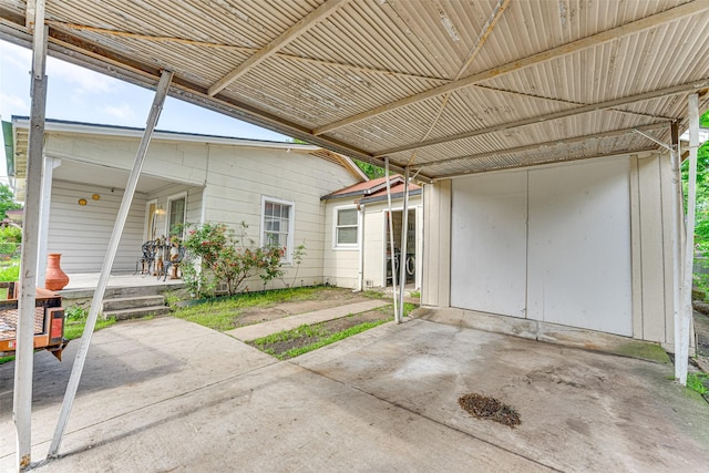2957 Darby Dr, Dallas, TX 75227 - view of patio / terrace with a carport and covered porch