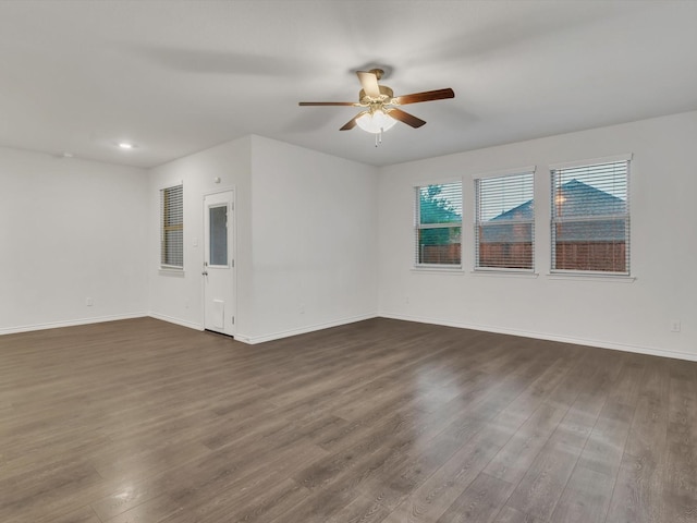 1116 Cobalt Dr, Celina, TX 75009 - empty room with dark wood-style flooring, ceiling fan, baseboards, and recessed lighting