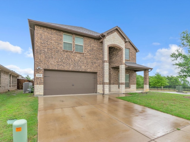 1116 Cobalt Dr, Celina, TX 75009 - view of front facade featuring an attached garage, brick siding, stone siding, and central air condition unit
