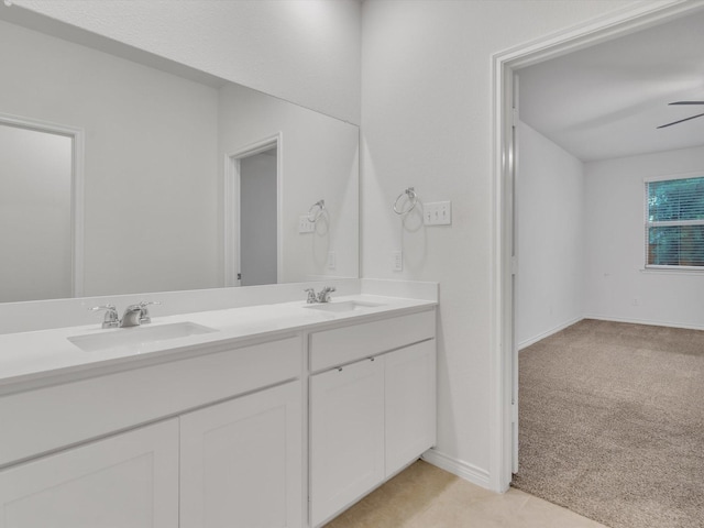1116 Cobalt Dr, Celina, TX 75009 - bathroom with double vanity, ceiling fan, and baseboards