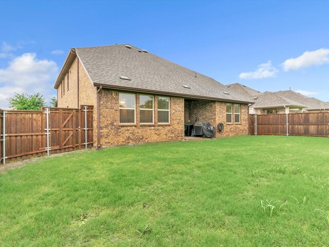 1116 Cobalt Dr, Celina, TX 75009 - rear view of property with brick siding and roof with shingles
