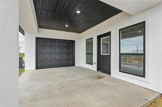 view of patio / terrace with concrete driveway