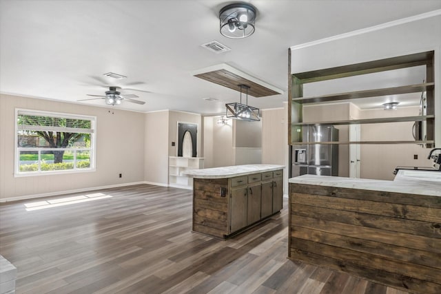 407 Sunset St, Malakoff, TX 75148 - kitchen with stainless steel fridge, dark wood-type flooring, a ceiling fan, a sink, and crown molding