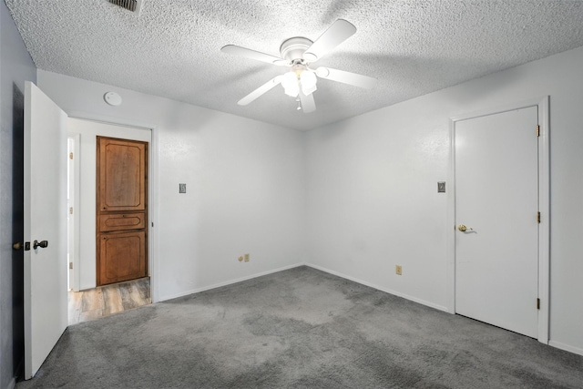 3908 Windhaven Rd, Fort Worth, TX 76133 - carpeted spare room with a ceiling fan, a textured ceiling, and a smoke detector