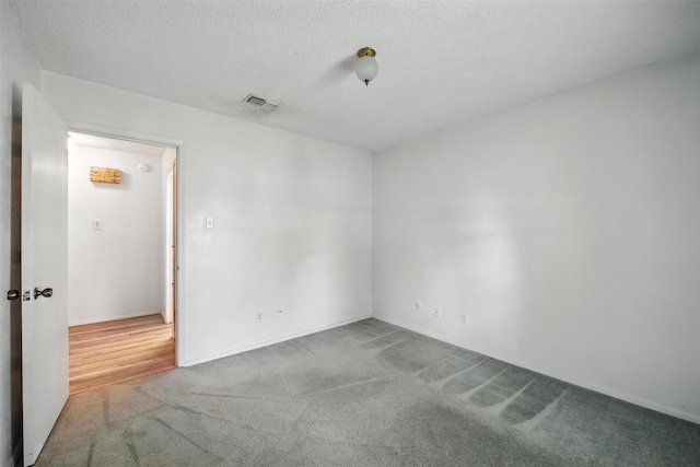 3908 Windhaven Rd, Fort Worth, TX 76133 - spare room with carpet and a textured ceiling