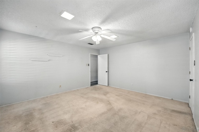 3908 Windhaven Rd, Fort Worth, TX 76133 - unfurnished bedroom featuring a textured ceiling, light carpet, and ceiling fan