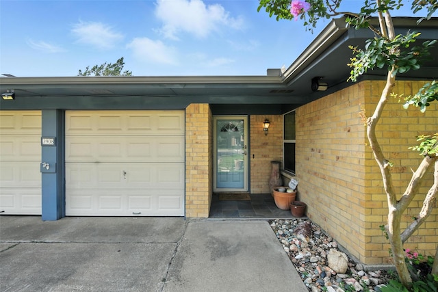 3908 Windhaven Rd, Fort Worth, TX 76133 - view of exterior entry featuring brick siding and concrete driveway