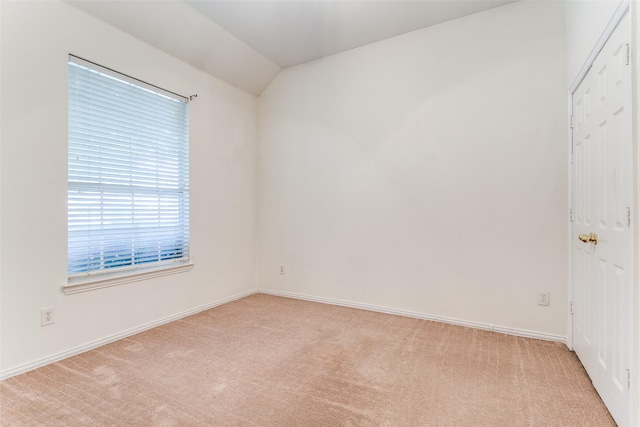 212 Longview Ct, Keller, TX 76248 - spare room with light colored carpet, lofted ceiling, and baseboards