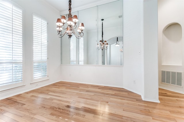 212 Longview Ct, Keller, TX 76248 - unfurnished dining area with a chandelier, wood finished floors, healthy amount of natural light, crown molding, and baseboards