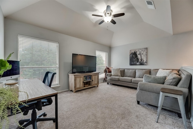living area with an office area, light colored carpet, ceiling fan, and vaulted ceiling