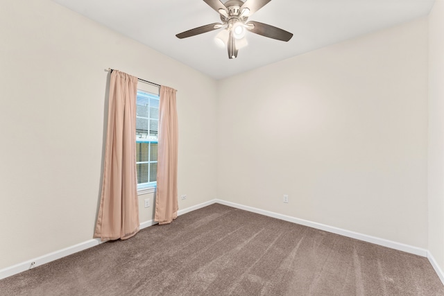 1504 Yale St, River Oaks, TX 76114 - empty room featuring dark carpet and a ceiling fan