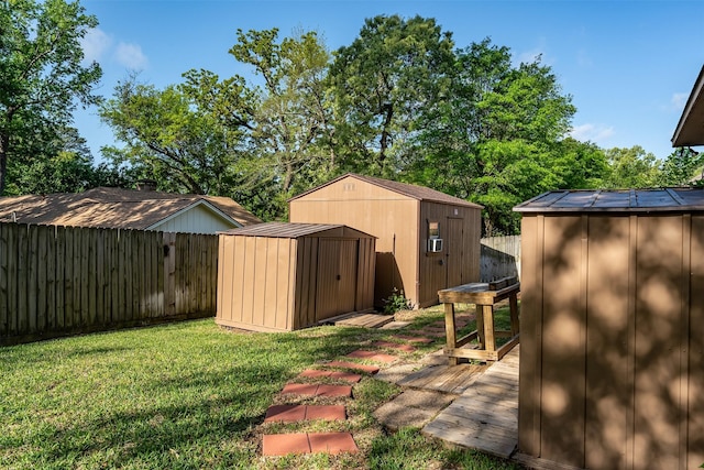 619 Wellington, Tyler, TX 75703 - view of yard with a storage unit, an outbuilding, and a wooden deck