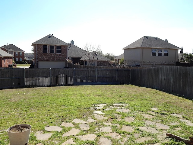 view of yard with a garage