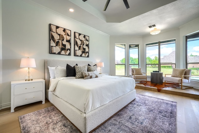 12809 Day Break Trl, Burleson, TX 76028 - bedroom with light wood finished floors, crown molding, recessed lighting, and a ceiling fan