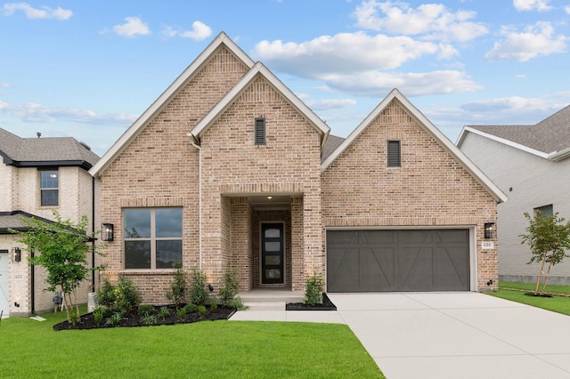 606 Lundy Ln, Mansfield, TX 76063 - view of front facade with brick siding, driveway, and a front lawn