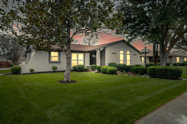 view of front of house with a front lawn
