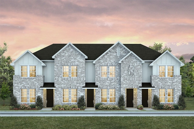 5236 Springlake Pkwy, Haltom City, TX 76117 - view of front of home with board and batten siding and brick siding
