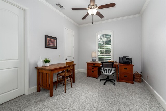 carpeted home office featuring ornamental molding, ceiling fan, and baseboards