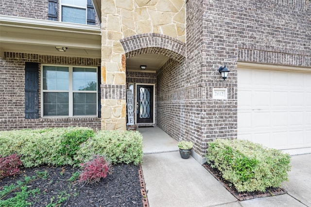 2612 Castle Creek Dr, Little Elm, TX 75068 - view of exterior entry featuring brick siding