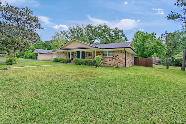 ranch-style house featuring brick siding
