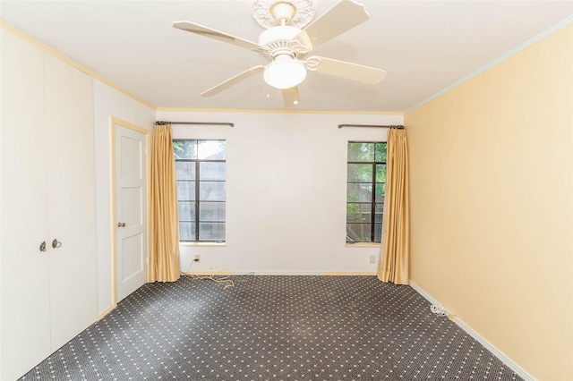2850 Claudette Ave, Dallas, TX 75211 - carpeted spare room featuring ornamental molding, ceiling fan, and baseboards