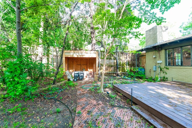 2850 Claudette Ave, Dallas, TX 75211 - fenced backyard with a deck