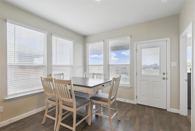 1206 Burlingame Dr, Cleburne, TX 76033 - dining space featuring baseboards and dark wood-style flooring