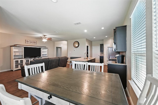1206 Burlingame Dr, Cleburne, TX 76033 - dining space with a ceiling fan, dark wood-type flooring, and recessed lighting