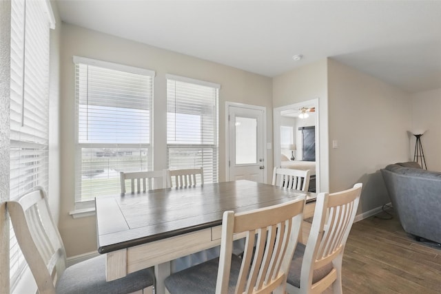 1206 Burlingame Dr, Cleburne, TX 76033 - dining space with baseboards, wood finished floors, and a ceiling fan