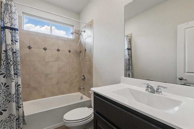 1206 Burlingame Dr, Cleburne, TX 76033 - bathroom featuring shower / bath combo, toilet, and vanity