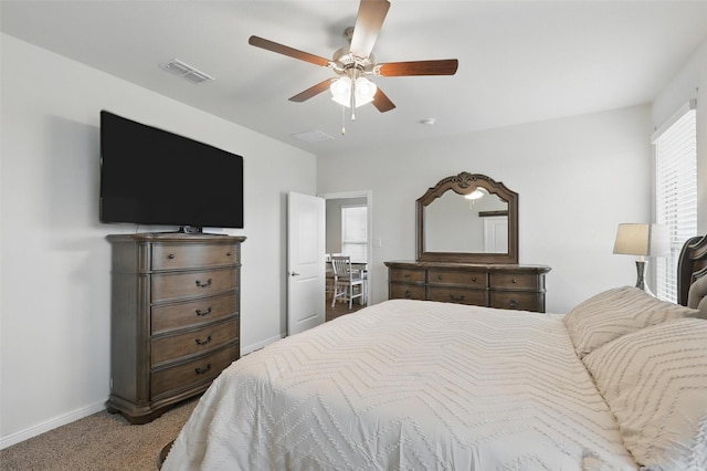 1206 Burlingame Dr, Cleburne, TX 76033 - carpeted bedroom with baseboards and ceiling fan
