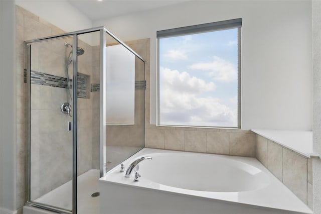 1206 Burlingame Dr, Cleburne, TX 76033 - bathroom featuring a stall shower and a bath