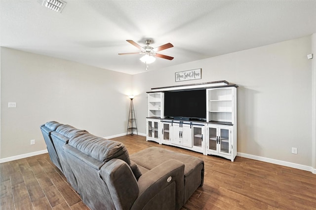 1206 Burlingame Dr, Cleburne, TX 76033 - living area with a ceiling fan and wood finished floors