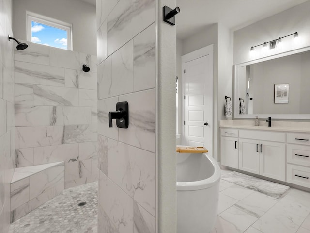 650 Winkler Way, Springtown, TX 76082 - full bath featuring marble look tiles, vanity, a freestanding bath, and tiled shower