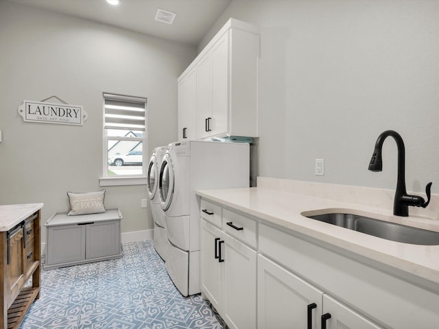 650 Winkler Way, Springtown, TX 76082 - laundry area with cabinet space, separate washer and dryer, baseboards, and recessed lighting