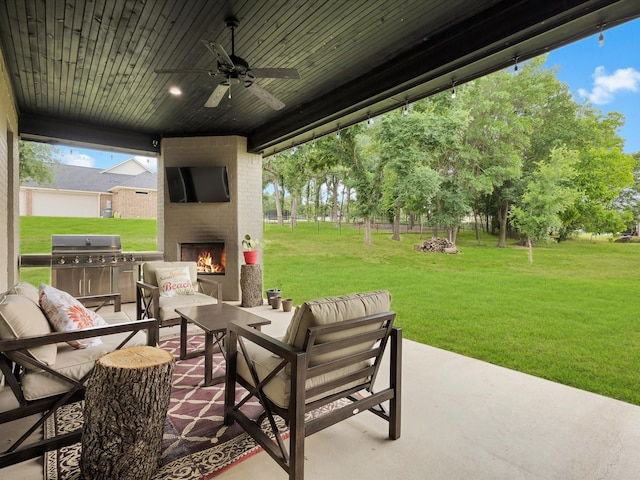 650 Winkler Way, Springtown, TX 76082 - view of patio / terrace featuring an outdoor living space with a fireplace, ceiling fan, and area for grilling