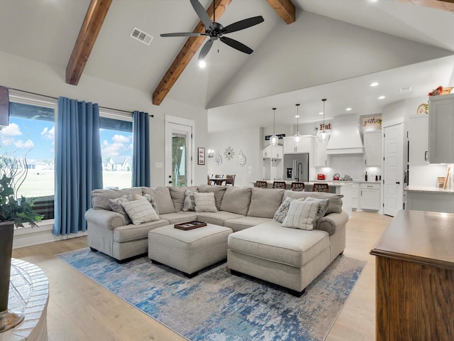 650 Winkler Way, Springtown, TX 76082 - living area with beam ceiling, ceiling fan, high vaulted ceiling, light wood finished floors, and recessed lighting