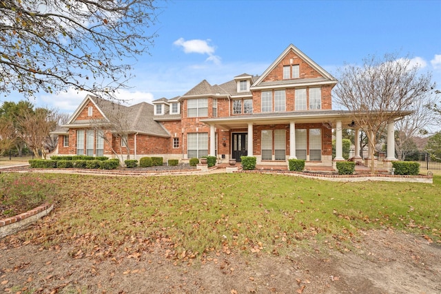5610 Kensington Ct, Parker, TX 75002 - view of front of property featuring covered porch, brick siding, and a front yard